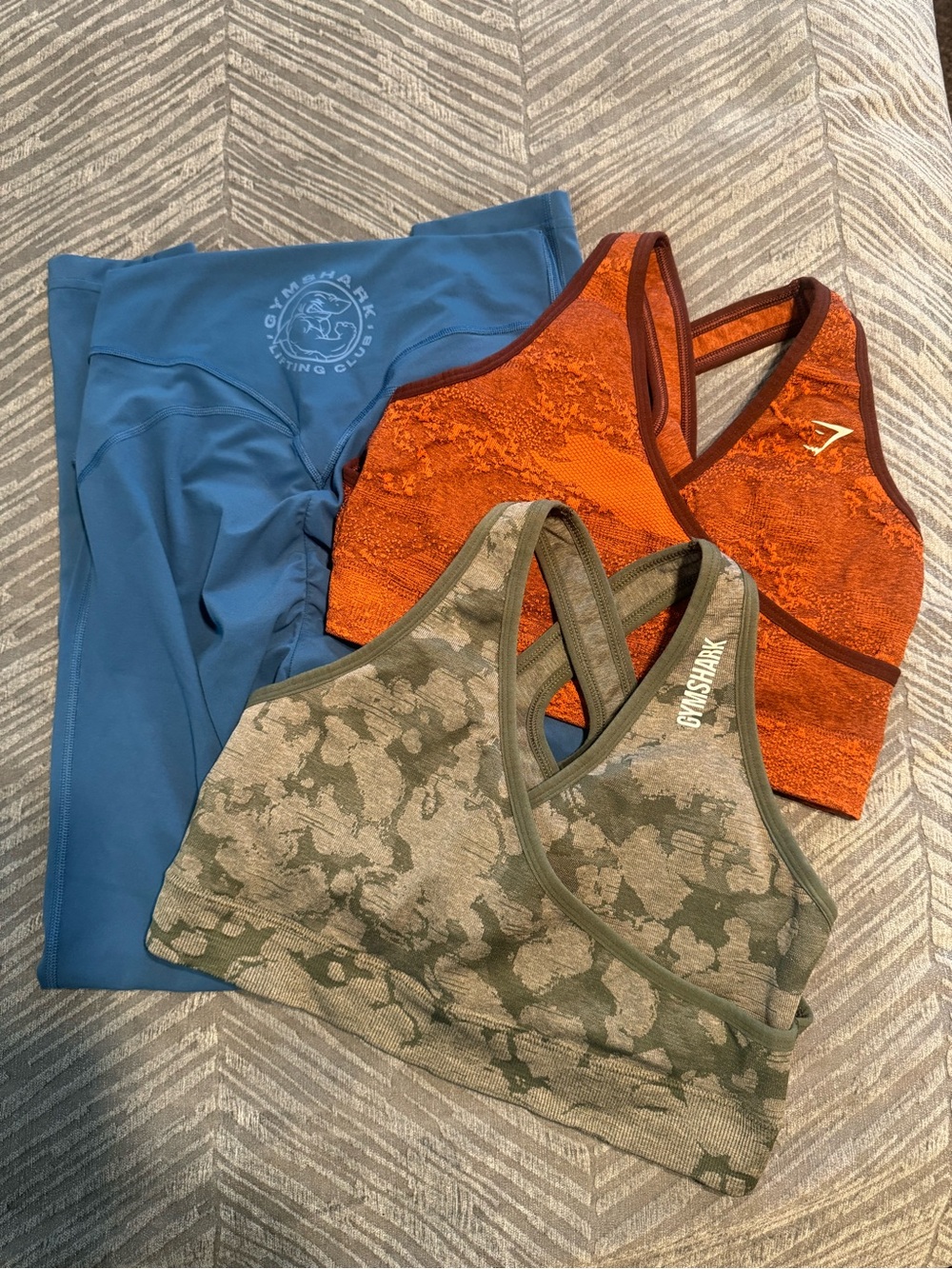 Gymshark Blue Leggings with Orange Textured Bra and Green Camo Bra